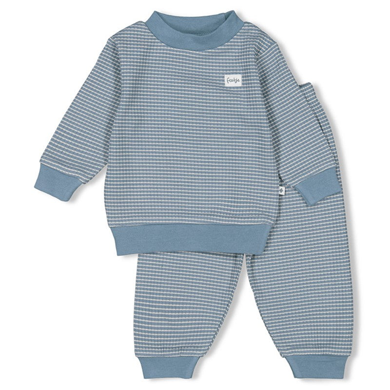 Feetje pyjama in een ijsblauwe kleur