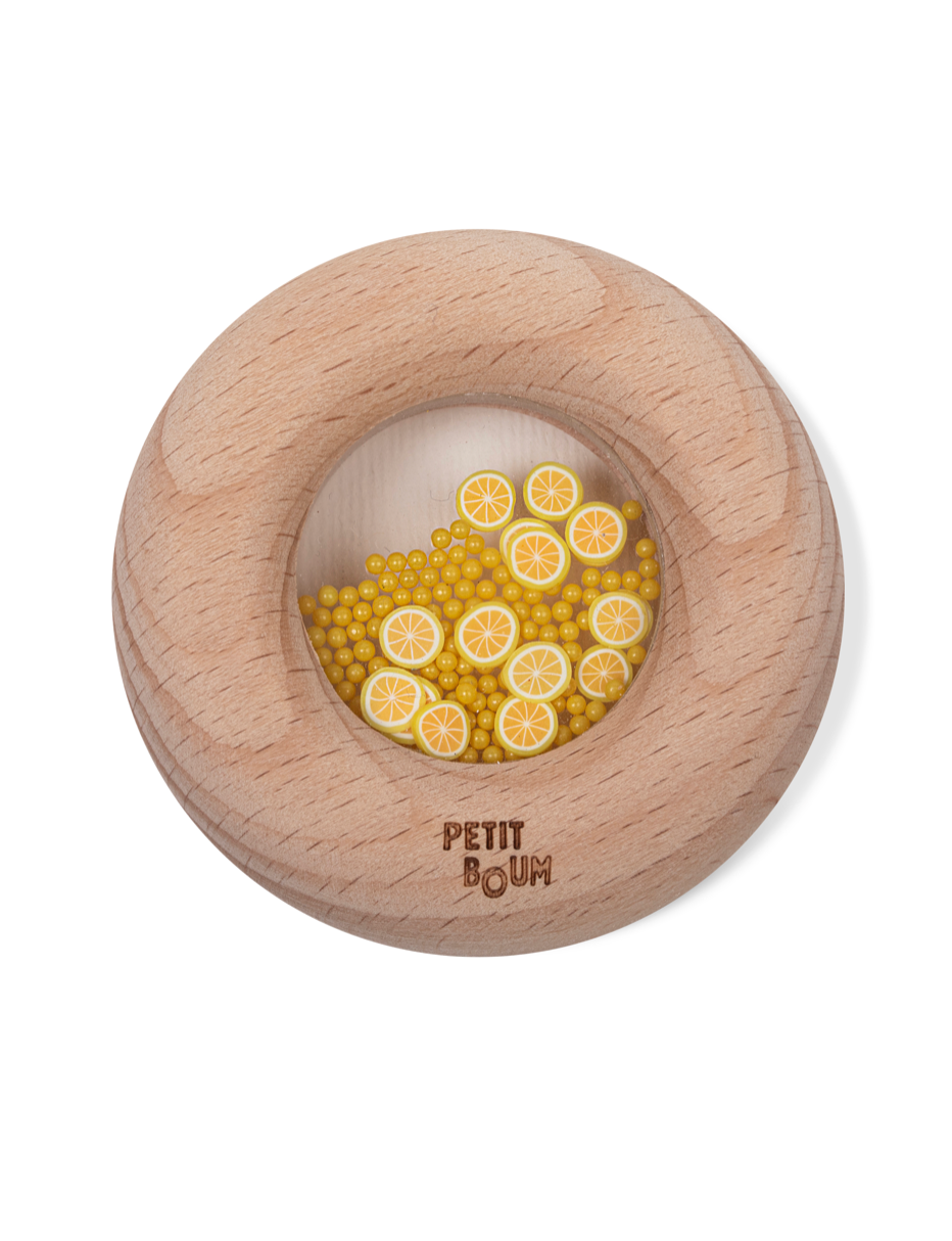 Petit Boum | sensorische donut citroen – houten babyspeelgoed met geluid