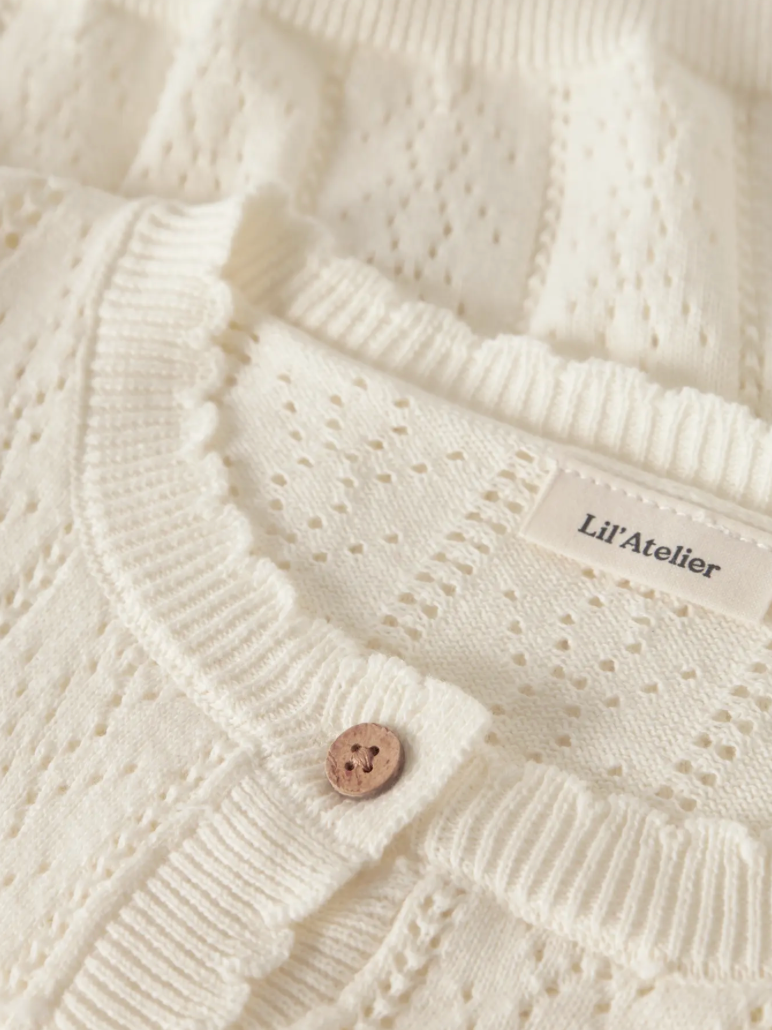 Lil’ Atelier | gebreid vestje meisje – crème cardigan biologisch katoen