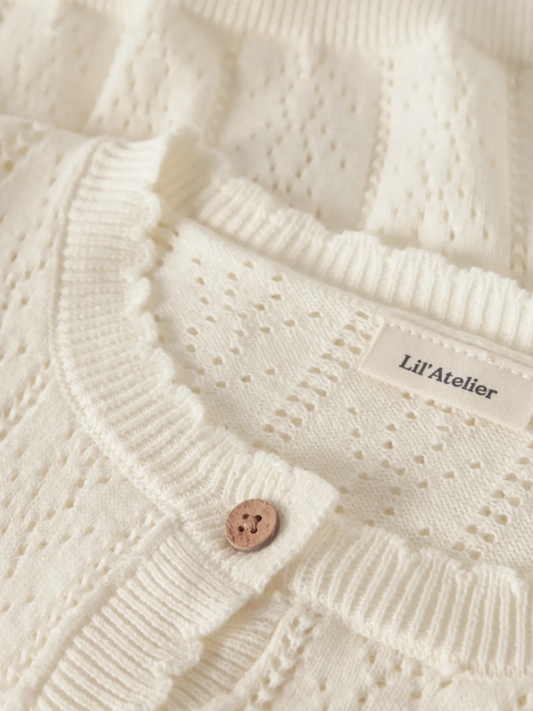 Lil’ Atelier | gebreid vestje meisje – crème cardigan biologisch katoen