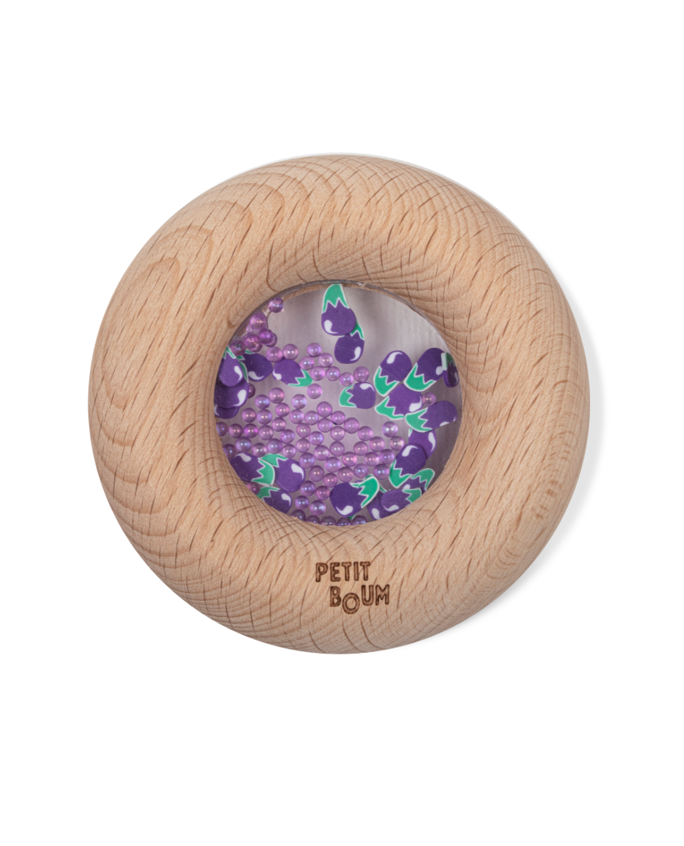 Petit Boum | Sensorische donut aubergine – houten babyspeelgoed met geluid