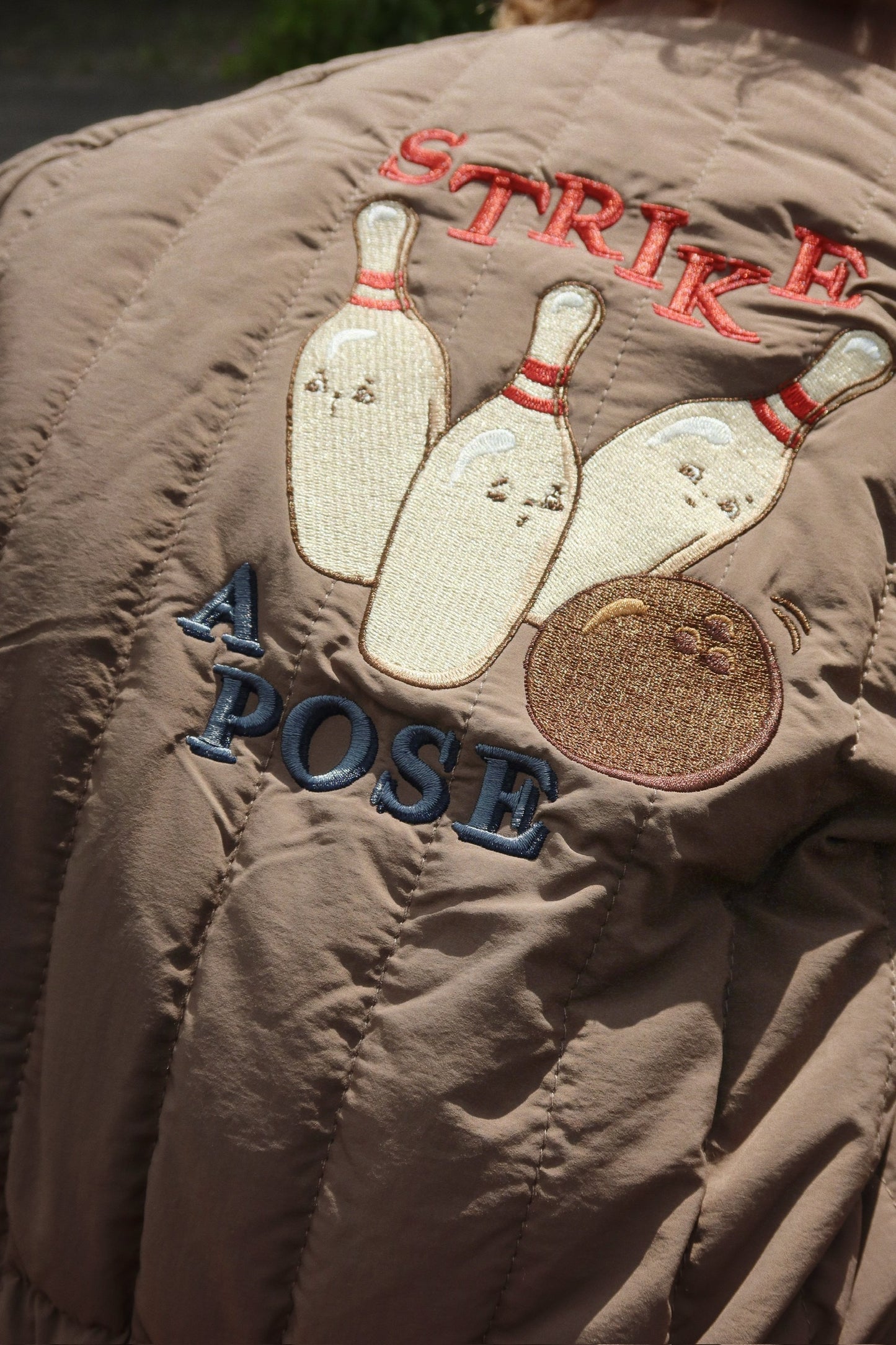 Konges Sløjd | Strike A Pose Bomber Jacket met Bowling Borduring